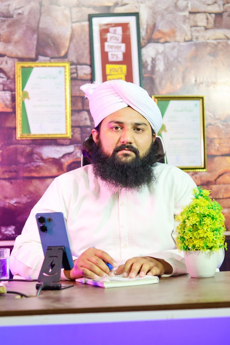 Shaikh Ehsan-ul-Haq Madani at his desk